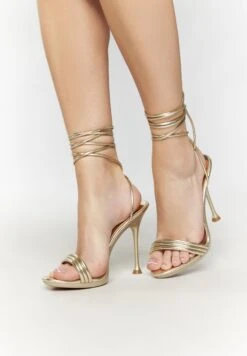 Faina Colina - Sandalen - Gold